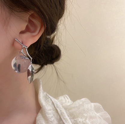Asymmetric acrylic peach earrings